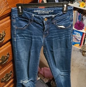 American Eagle jeans, dark blue/hole in the knee, super stretch size 4 regular